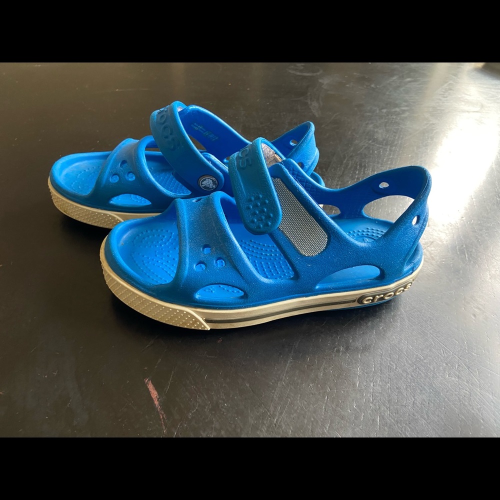 Kids Size 11 Crocs. Great condition. Velcro adjusting straps.